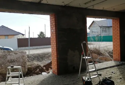 Установка двух секционных ворот в частный дом